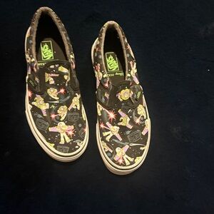 Vans Black Slip-On Sneakers with Multicolor Buzz Lightyear Print
